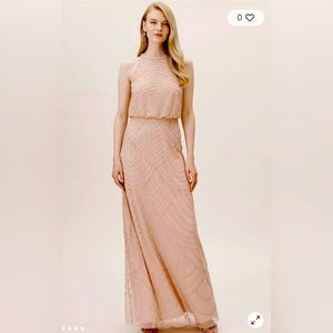 Back zip
Polyester; polyester lining
Professionally clean